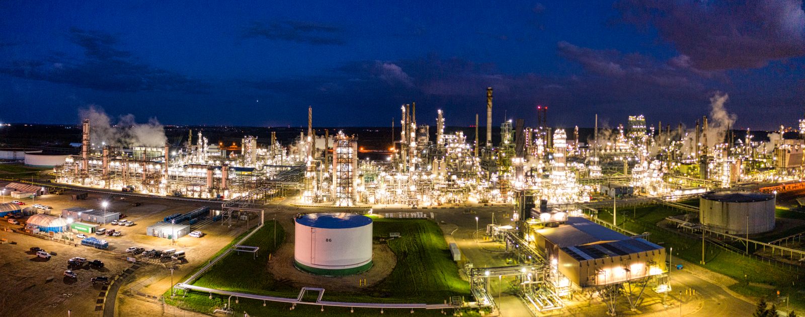 Illuminated petroleum refinery at night